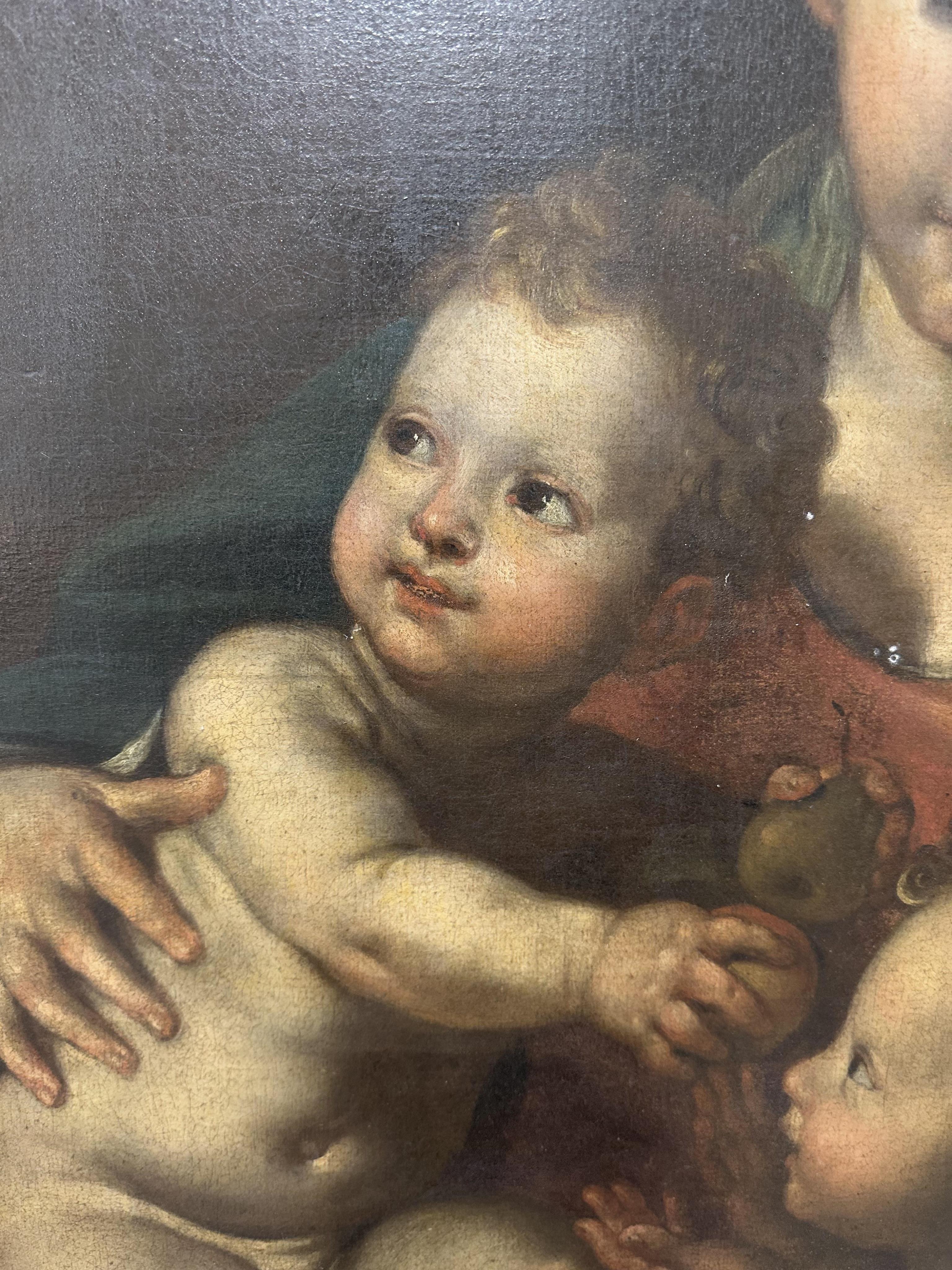 Circle of Domenico Zampieri, called il Domenichino, Italian 1581-1641, 'The Madonna and Child with the infant Saint John the Baptist and Angels'